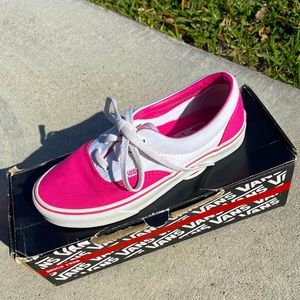 Pink and white Vans shoes